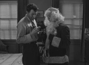 Neighbourhood fixture Bobo (Elisha Cook Jr.) gives Mike Hammer (Biff Elliot) a clue in Harry Essex's I, the Jury (1953)