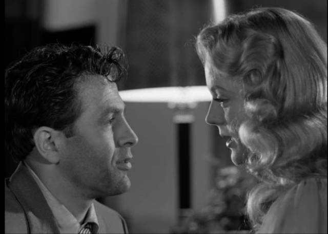 Mike Hammer (Biff Elliot) pays a final visit to psychologist Charlotte Manning (Peggie Castle) in Harry Essex's I, the Jury (1953)