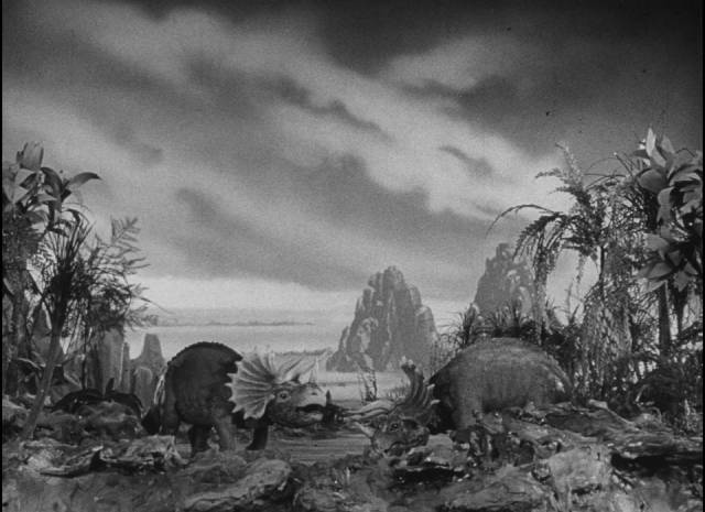 Battling dinosaurs are part of Ro-Man's plan to conquer Earth in Phil Tucker's Robot Monster (1953)