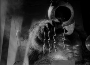 Great Guidance zaps the disobedient Ro-Man from the home world in Phil Tucker's Robot Monster (1953)
