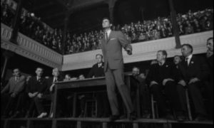Josef K. (Anthony Perkins) addresses a hostile court in Orson Welles's The Trial (1962)