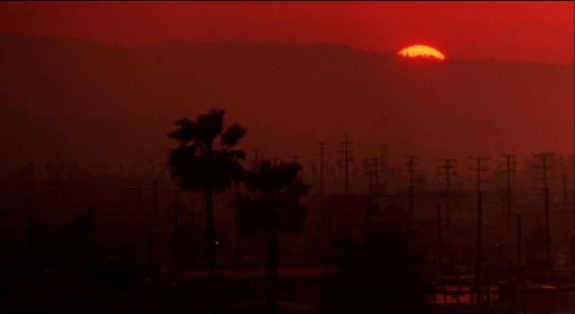 Sunrise in Los Angeles suggests a Hellscape in William Friedkin's To Live and Die in L.A. (1985)