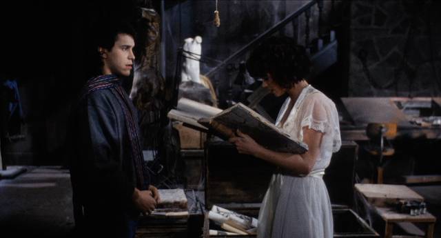 Art student Whitney Taylor (Debrah Farentino) discovers a dangerous text in John Carl Buechler’s Cellar Dweller (1987)