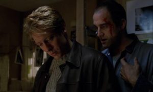 Crash guru Vaughan (Elias Koteas) is aroused by James Ballard (James Spader)'s interest in bodily injury in David Cronenberg's Crash (1996)