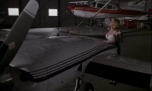 Catherine Ballard (Deborah Kara Unger) has anonymous sex with a stranger and a plane in David Cronenberg's Crash (1996)