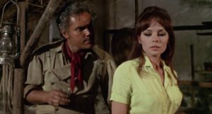 Pascale Petit attempts to hire embittered ex-soldier Jeffrey Hunter in Giuliani Carnimeo's Find a Place to Die (1968)