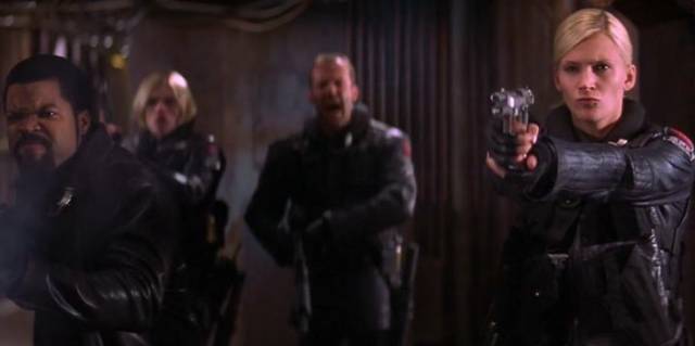 Members of a paramilitary police unit run up against an ancient Martian threat in John Carpenter's Ghosts of Mars (2001)
