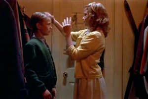 Kimberley (Erica Zawadowski) tries to save herself and Nicholas (Jeff Sutton) from embarrassment during a party game in Jeff Erbach's The Nature of Nicholas (2002)