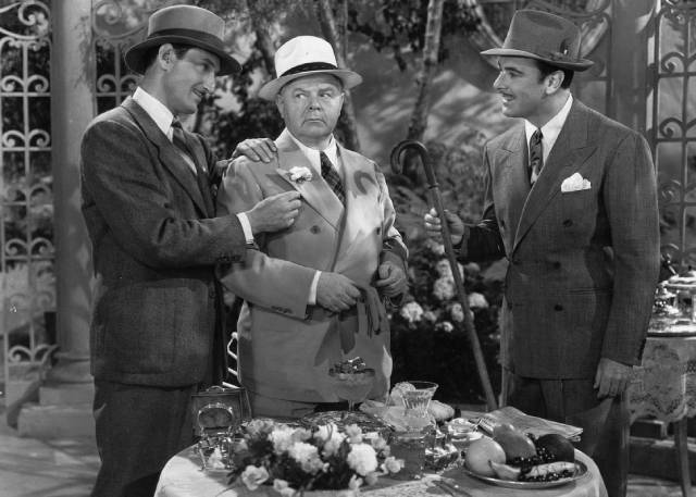 Scotland Yard's Basil Rathbone and the FBI's George Brent close in on Nazi Gene Lockhart in Tim Whelan's International Lady (1941)
