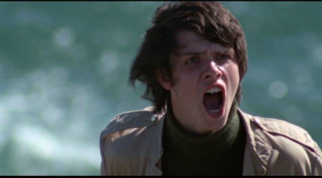 Cloistermouth (Nicholas Hoye) panics when he realizes his privileged position is threatened in John Mackenzie's Unman, Wittering and Zigo (1971)