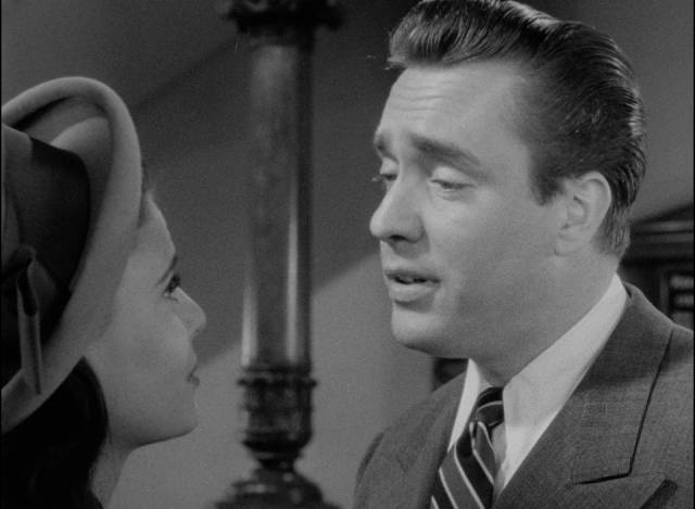 Lawyer David Douglas (Edmond O'Brien) dislikes girlfriend Ellie (Geraldine Brooks)'s father in Michael Gordon's An Act of Murder (1948)