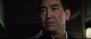 Unwilling to take authority, Shinjirô Nakai (Kôji Tsuruta) is unable to act to protect the family in Kôsaku Yamashita’s Big Time Crime Boss (1968)