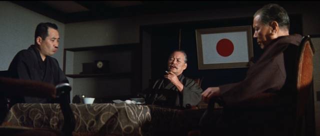 Counsellor Senda (Nobuo Kaneko) tries to draw the family into a destructive deal in Kôsaku Yamashita’s Big Time Crime Boss (1968)