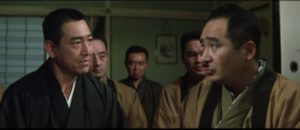 Shinjirô Nakai (Kôji Tsuruta) confronts (Nobuo Kaneko) about his shady scheme in Kôsaku Yamashita’s Big Time Crime Boss (1968)