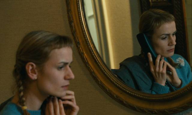 Sophie (Sandrine Bonnaire) eavesdrops on an important phone call in Claude Chabrol’s La cérémonie (1995)