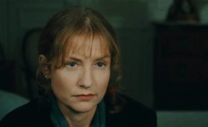 Postmistress Jeanne (Isabelle Huppert) despises those who consider themselves better than her in Claude Chabrol’s La cérémonie (1995)