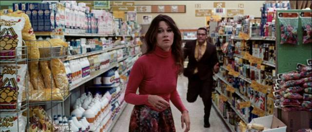 Laura (Anitra Ford) finds herself an object of consumption at the supermarket in Willard Huyck and Gloria Katz’s Messiah of Evil (1974)