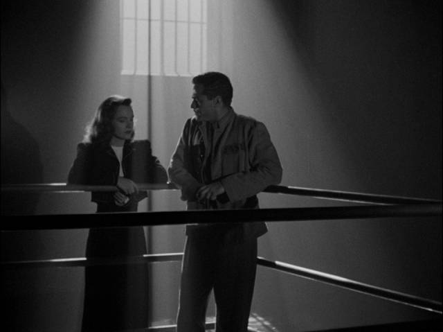 Secretary Carol (Ella Raines) tries to save her boss Scott Henderson (Alan Curtis) from death row in Robert Siodmak's Phantom Lady (1944)