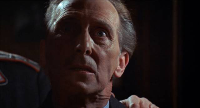 Major Heinrich Benedek (Peter Cushing) is eliminated by conspirators determined to take over the world in Gordon Hessler's Scream and Scream Again (1970)