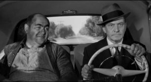 Daniel Hilliard (Fredric March) struggles to contain his anger towards killer Sam Kobish (Robert Middleton) in William Wyler's The Desperate Hours (1955)