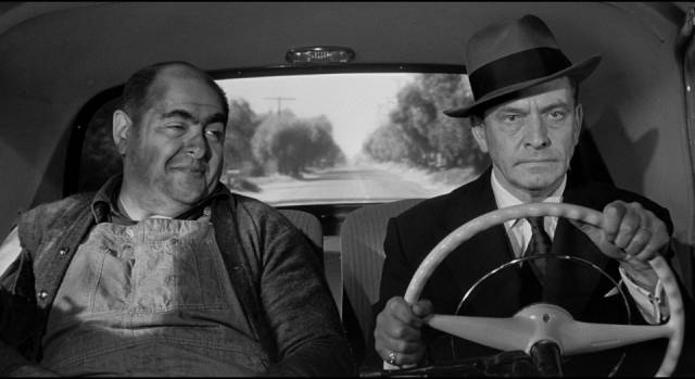 Daniel Hilliard (Fredric March) struggles to contain his anger towards killer Sam Kobish (Robert Middleton) in William Wyler's The Desperate Hours (1955)
