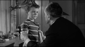 Daniel Hilliard (Fredric March) explains to son Ralph (Richard Eyer) that caution isn't cowardice in William Wyler's The Desperate Hours (1955)