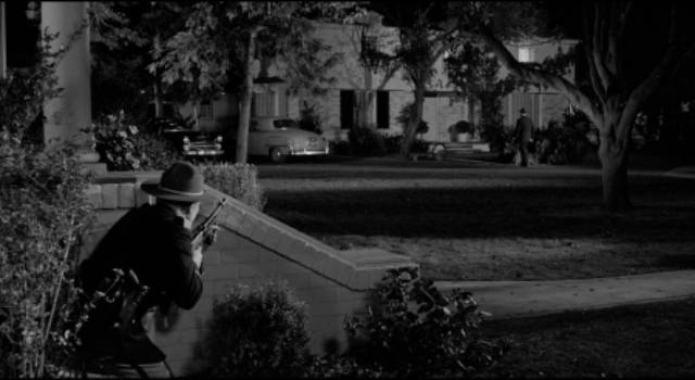 Police are unconcerned with the safety of the hostages in William Wyler's The Desperate Hours (1955)