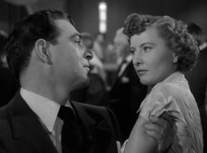Casino manager Horace Corrigan (Stephen McNally) recognizes Joan Booth (Barbara Stanwyck)'s addiction in Michael Gordon's The Lady Gambles (1949)
