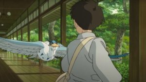 A mystical bird attracts Mahito's attention in Hayao Miyazaki's The Boy and the Heron (2023)