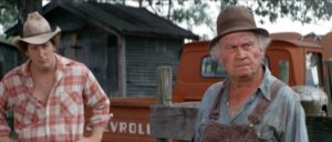 Grandpaw Bridges (Dub Taylor) doesn't want to talk about what he's seen in Joy Houck Jr.s Creature From Black Lake (1976)