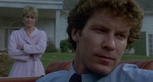 The marital problems of Donna (Dee Wallace) and Vic Trenton (Daniel Hugh Kelly) seem to trigger a form of natural retribution in Lewis Teague's Cujo (1983)