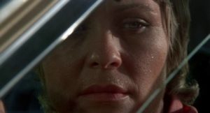 Trapped in her car, Donna Trenton (Dee Williams) engages in a battle of wills in Lewis Teague's Cujo (1983)