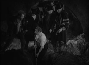 Squire Corder (Tod Slaughter) is forced to exhume his victim in the barn in Milton Rosmer’s Maria Marten, or the Murder in the Red Barn (1935)