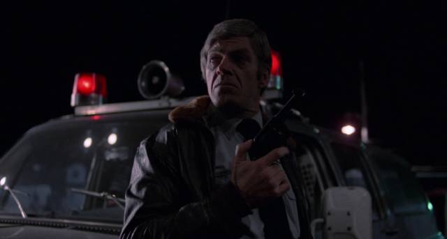 Police Chief Newby (Don Francks) realizes that the horror is beginning again in George Mihalka's My Bloody Valentine (1981)