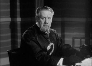 Michael Larron (Tod Slaughter) leads the Black Quorum, and international criminal conspiracy, in George King's Sexton Blake and the Hooded Terror (1938)