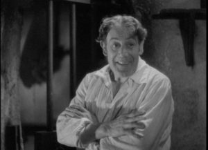 The barber (Tod Slaughter) gleefully promises to "polish off" his customers in George King’s Sweeney Todd: The Demon Barber of Fleet Street (1936)