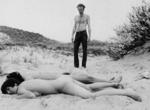 Max (Jack Rader) breaks down inhibitions by raping a couple on the Fire Island beach in Walter Burns' Barbara (1970)