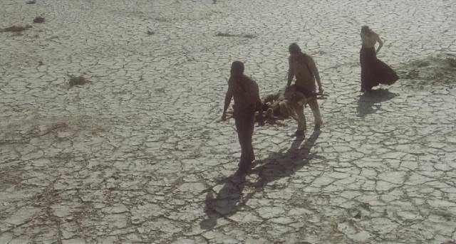 Abandoned, the exiles wander through the desert in Lucio Fulci's The Four of the Apocalypse (1975)