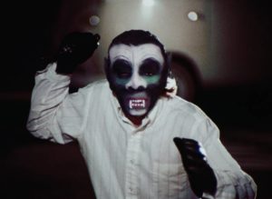 A masked madman preys on prostitutes in Albert Zugsmith's Violated (1975)