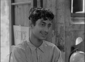 Adolescent Apu (Smaran Ghosal) is ecstatic to be admitted to school in Satyajit Ray's Aparajito (1956)