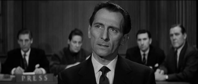 Captain Judd (Peter Cushing) smears another pilot's reputation in Charles Frend's Cone of Silence (1960)