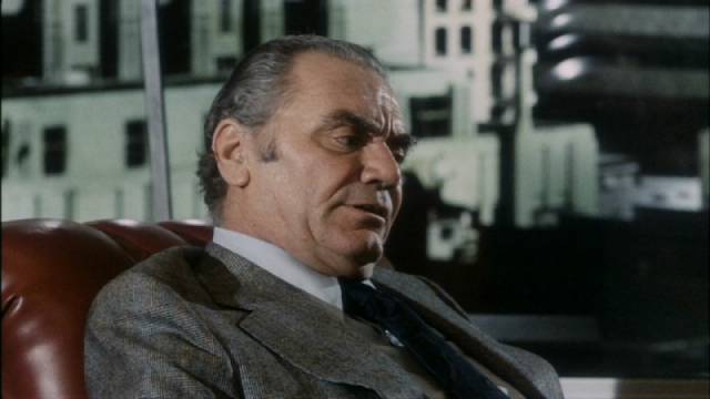 Head of detectives Santoro (Ernest Borgnine) orders Phil Gaines (Burt Reynolds) to shelve his investigation in Robert Aldrich's Hustle (1975)
