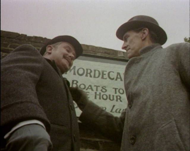 Sherlock Holmes (Peter Cushing) and Dr. Watson (Nigel Stock) follow the clues in the BBC's 1968 series