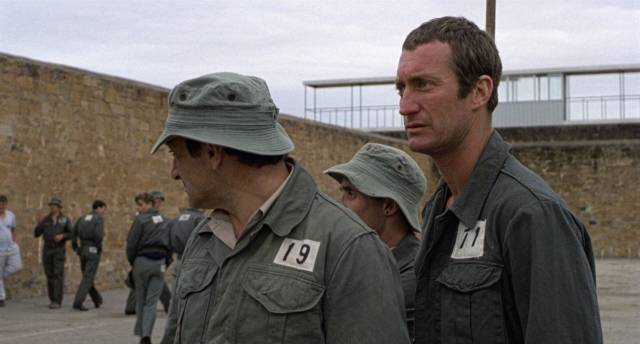 China Jackson (Bryan Brown) is concerned by tensions spreading through the prison in Stephen Wallace's Stir (1980)