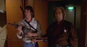 Rick (Scott Glenn) and Yoshida (Toshiro Mifune) set out together to right a historical wrong in John Frankenheimer's The Challenge (1982)