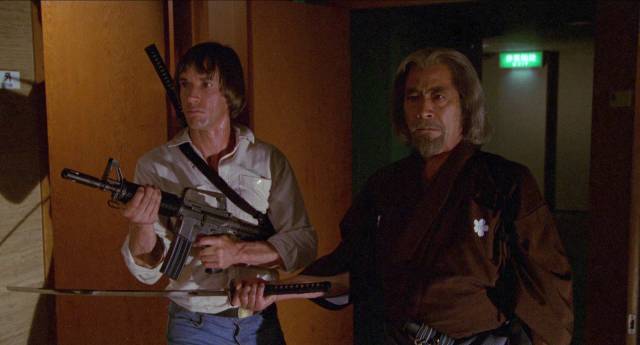 Rick (Scott Glenn) and Yoshida (Toshiro Mifune) set out together to right a historical wrong in John Frankenheimer's The Challenge (1982)