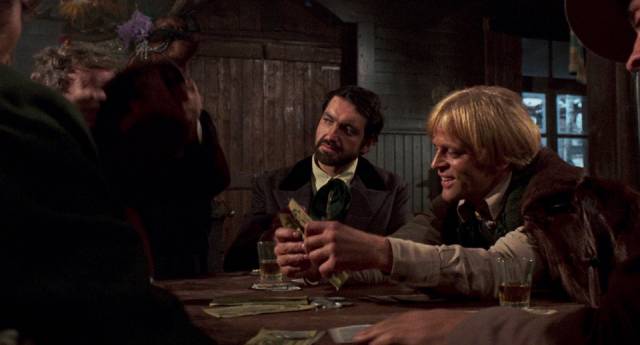 Tigrero (Klaus Kinski) takes a break from murdering people for money in Sergio Corbucci's The Great Silence (1968)