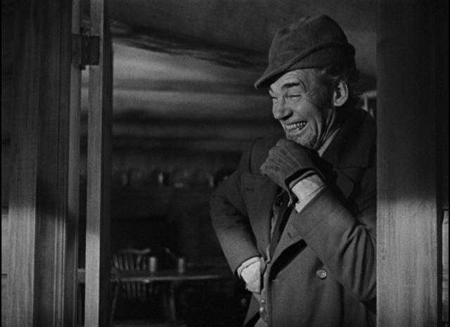 Happiness is a joke to Mr. Scratch (Walter Huston) in William Dieterle's All That Money Can Buy (1941)