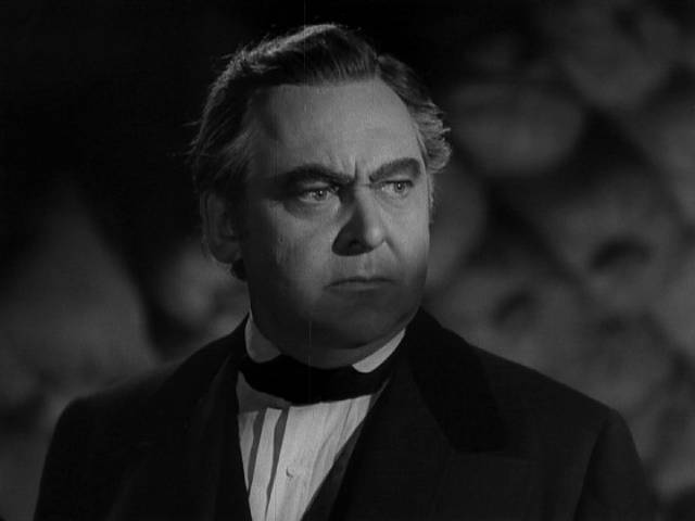 Lawyer and politician Daniel Webster (Edward Arnold) defeats Mr. Scratch (Walter Huston)with patriotic sentiment in William Dieterle's All That Money Can Buy (1941)