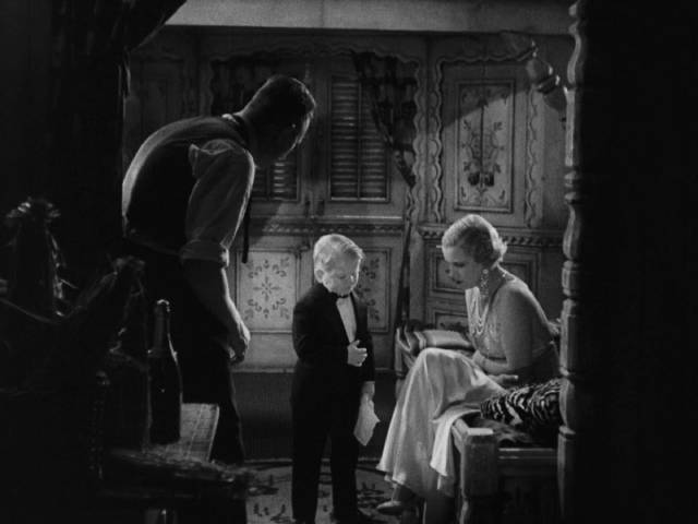 Hans (Harry Earles) begins to fall ill soon after his marriage to Cleopatra (Olga Baclanova) in Tod Browning's Freaks (1932)